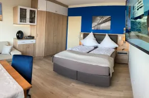 Seu apartamento com uma maravilhosa vista panorâmica da marina Burgtiefe - Image 4