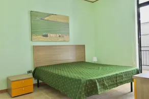 Two-room apartment for 4 people consisting of a living room with kitchenette, double or twin sofa bed, a double bedroom; bathroom with shower. <br>They can be on the ground floor or first floor. <br>Balcony or garden equipped with table and chairs. <br>C - Image 5