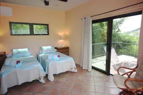 Escape to \"Over the Rainbow\" – your own private Caribbean cottage complete with a private pool, ocean view, and a/c. Experience tranquility in a stunning tropical paradise. Book your dream getaway today! - Image 5