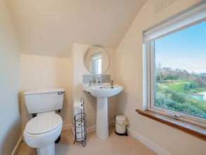 Enjoy stunning sea views from this traditional cottage on the coast of Arran. - Image 3