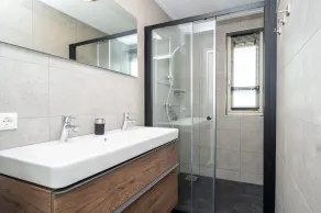 Stay in our Anchor 14 Wellness family home with a sauna, an outdoor spa, and a sunshower. - Image 5