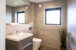 A contemporary glass fronted lake side home that sleeps 8 guests  in 4 bedrooms - Image 3