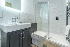 A spacious and beautifully renovated barn conversion with three bedrooms. - Image 2