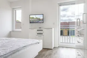 Bright and friendly: This modern first floor apartment offers approx - Image 4