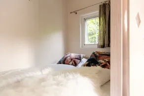 Luxury glamping is done in this colorful Scandinavian lodge. - Image 5
