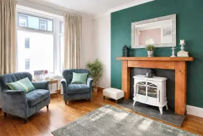 Discover Ty Hapus, a modern 3-bedroom townhouse perfect for 6 guests. Enjoy a private backyard . Located in a highly walkable neighborhood (score: 95) with vibrant culture, history, and excellent transit links to the Welsh coast, Cardiff and Swansea. - Image 3
