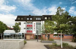 XZLLENZ Hotel - Image 5