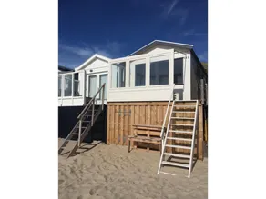 Cozy Beachfront Retreat with Scenic Terrace - Image 3