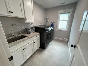 Brand new house with water views just steps from beach! - Image 3