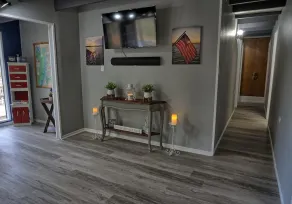 Holiday House (Sleeps 1-12) - Offer a 4-bedroom, 2-bath unit with 1 queen, 3 full, 4 twin beds, and a pull-out sofa. - Image 3