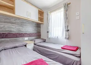 Spacious and luxurious 12ft-wide caravan with one double and two twin bedrooms. - Image 5