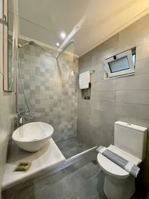 Chrysoula’s Welcoming Triple Room with Yard - Image 3