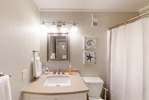 Modern condo in oceanfront building with pools, hot tubs, arcade, & beach access - Image 3