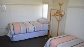 Cute, well-appointed beach house with ocean views and a short walk to all village amenities. - Image 4