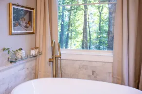 Spivey Manor · Sink into the Luxe Corner Tub at an Upscale, Spacious Home - Image 3