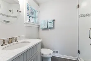 Spacious deck has ocean views as home is across the street from the beachblock. - Image 2