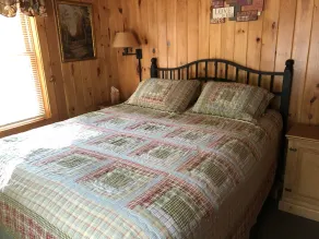 Quiet secluded log cabin; the cabin is part of a 37 acre waterfront complex. - Image 5