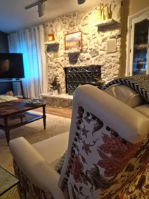 We are a quiet ranch home that sits on 8 acres with firepit, pond and bar. - Image 2