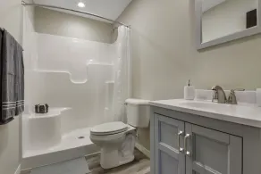 Up North Living!  Fully renovated one-level living home in wooded lot near lake. - Image 3