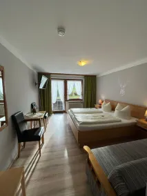 Vacation apartment with a view of the beer garden, shower, toilet, and balcony - Image 5