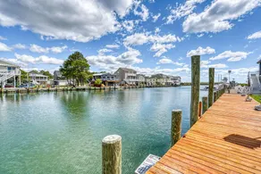 Off Duty | Waterfront, Dock & Boat Lift, Screened Porch, Tiki Bar + Community Pools, Pet Friendly - Image 2