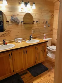 Family log home nestled in the woods just minutes from trails. - Image 3