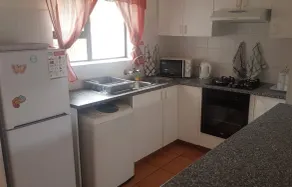 A comfortable livingroom, fully equipped kitchen make you feel at home apartment - Image 4