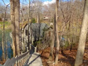 Unique cabin that sits right on the water. Huge deck. Amazing views. Gas grill. - Image 5