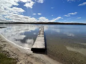 Quaint Lakefront Escape, private shoreline, Dock, Kayaks, Sleeps 6 Near Petoskey - Image 2