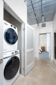 Spacious Luxury 2BR Apt with Gym, Parking, and Rooftop - Image 2