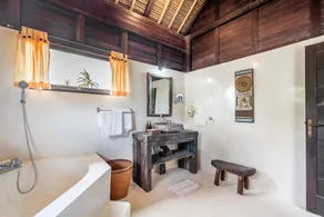 Deluxe Room with Balcony and Ocean View | The Village of Angels Resort - Image 3