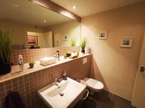 This stylish place to stay is perfect for families with a huge living space and big bedrooms - Image 2