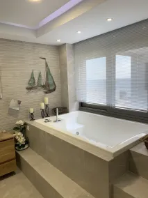 Exclusive beachfront penthouse retreat with private hot tub - Image 4