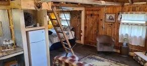 Wood Haven Lodge. Secluded, cozy log cabin in Northern Michigan. - Image 5