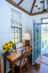 Beckons you to enjoy an idyllic farm stay in a colonial home for 16 guests. - Image 4