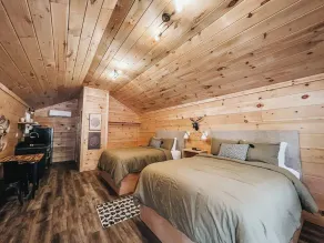 Cabin #6: Studio style layout with kitchenette and a large gravel parking pad beside the cabin for easy boat or trailer storage. - Image 4