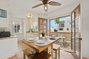 North PB Jewel: Sun-Soaked Second Story, Steps to Beach & Tourmaline Surfing - Image 4
