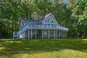 Stunning lakeside home with dock, large deck, firepit, & pool table - Image 5