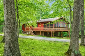 River Cabin w hot tub, fire pit, deck, games, wifi - Image 1