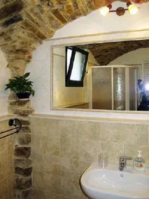 CASA ANTONELLA studio in the countryside in Terzorio with sea view terrace. - Image 2