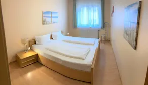 Aconchegante apartamento de 2 quartos - varanda, Wi-Fi, TV, perto do centro da cidade - Image 4
