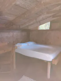 Red Eft Rustic Camping Cabin at Camp Earth Connection - Image 5