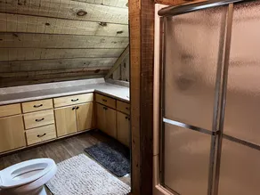 Cabin with hot tub, fire pit, and fishing pond. - Image 4