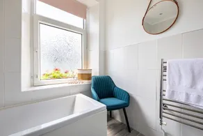 Discover Ty Hapus, a modern 3-bedroom townhouse perfect for 6 guests. Enjoy a private backyard . Located in a highly walkable neighborhood (score: 95) with vibrant culture, history, and excellent transit links to the Welsh coast, Cardiff and Swansea. - Image 5
