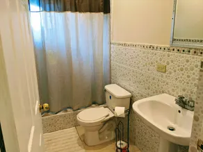 Smile Tangerine - One Bedroom Apartment - King Bed - Secure  Centrally Located - Image 2