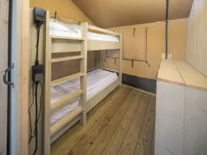 Experience luxury glamping in the elevated Safari Tent Ranger by the water. - Image 3
