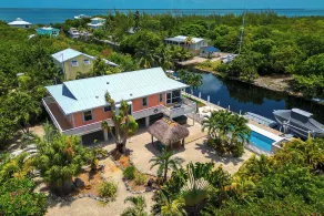 Tropical Oasis with Beautiful Home, Pool, Dock and Tiki Hut - Image 3