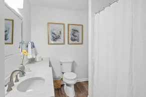 A beautifully designed 4BR/3BA cottage on Mobile Bay, with a large yard, screened porch and private fishing pier. Quiet and peaceful, this spacious retreat sleeps 8 and is made for slow mornings and gorgeous sunsets. - Image 2