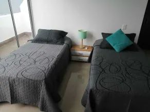 Apartamento amoblado a 5 minutos del aeropuerto, con  excelente vista al mar. - Image 2