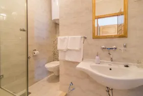 7-BR Beachfront Villa with Seaside Terrace and Heated Swimming Pool - Image 4